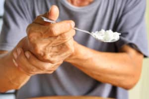 man with arthiritis can't lift spoon, may need FM Doctor