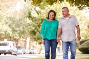 lady walking with husband outside may need natural thyroid treatment